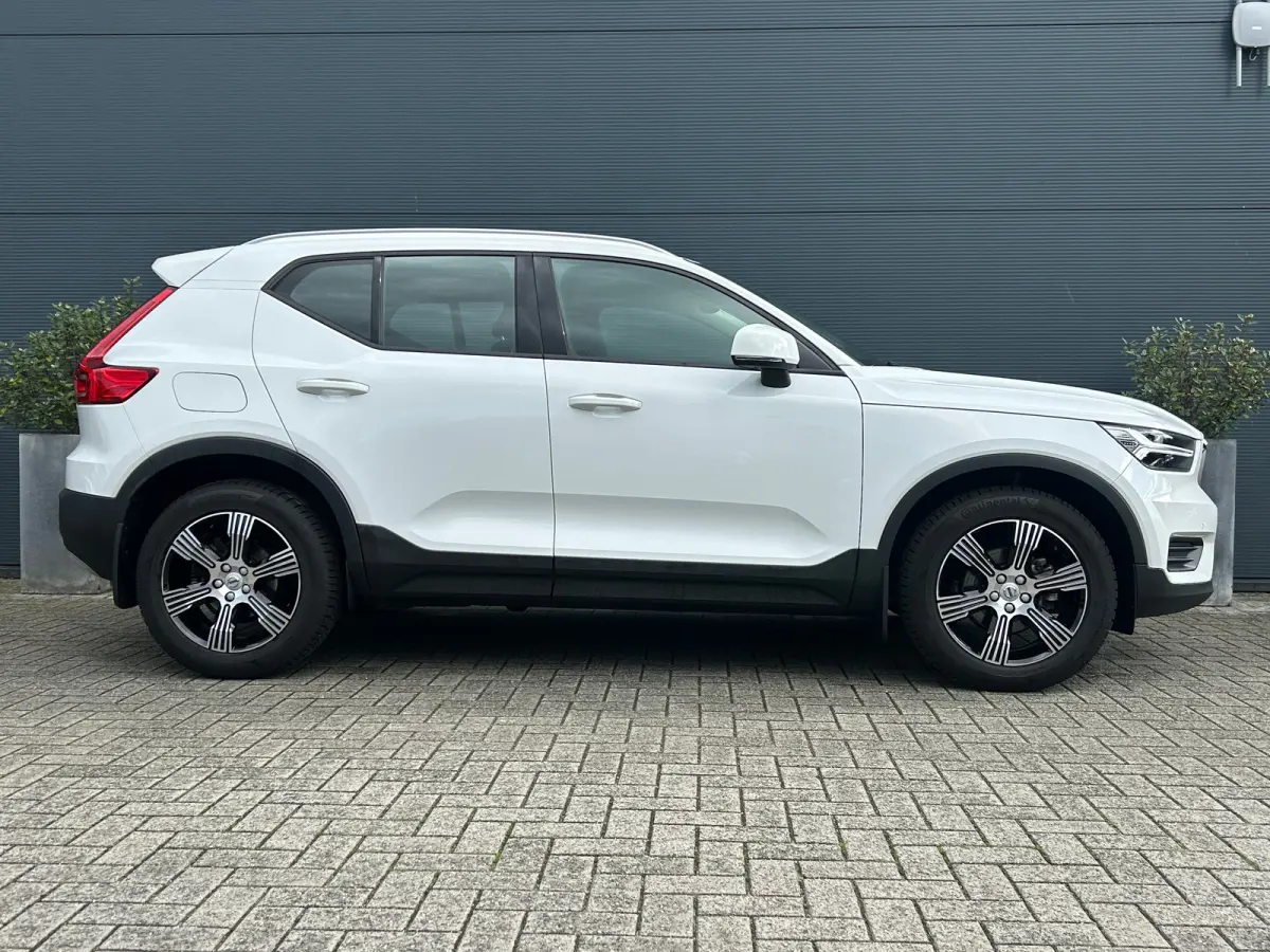 1.5 T3 Momentum | Camera | Cruise Control | Navigatie | Lane Assist | Spiegels dimmend |