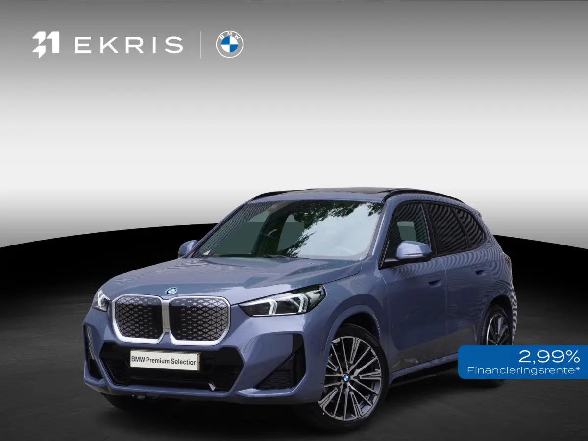 eDrive20 67 | M Sportpakket | Comfort Pack | 20 inch Multispaak | Trekhaak met elektrisch wegklapbare kogel | Glazen panoramadak | Harman-Kardon sound system
