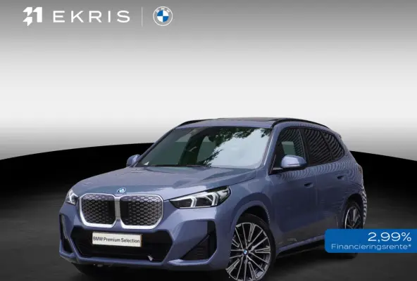 eDrive20 67 | M Sportpakket | Comfort Pack | 20 inch Multispaak | Trekhaak met elektrisch wegklapbare kogel | Glazen panoramadak | Harman-Kardon sound system