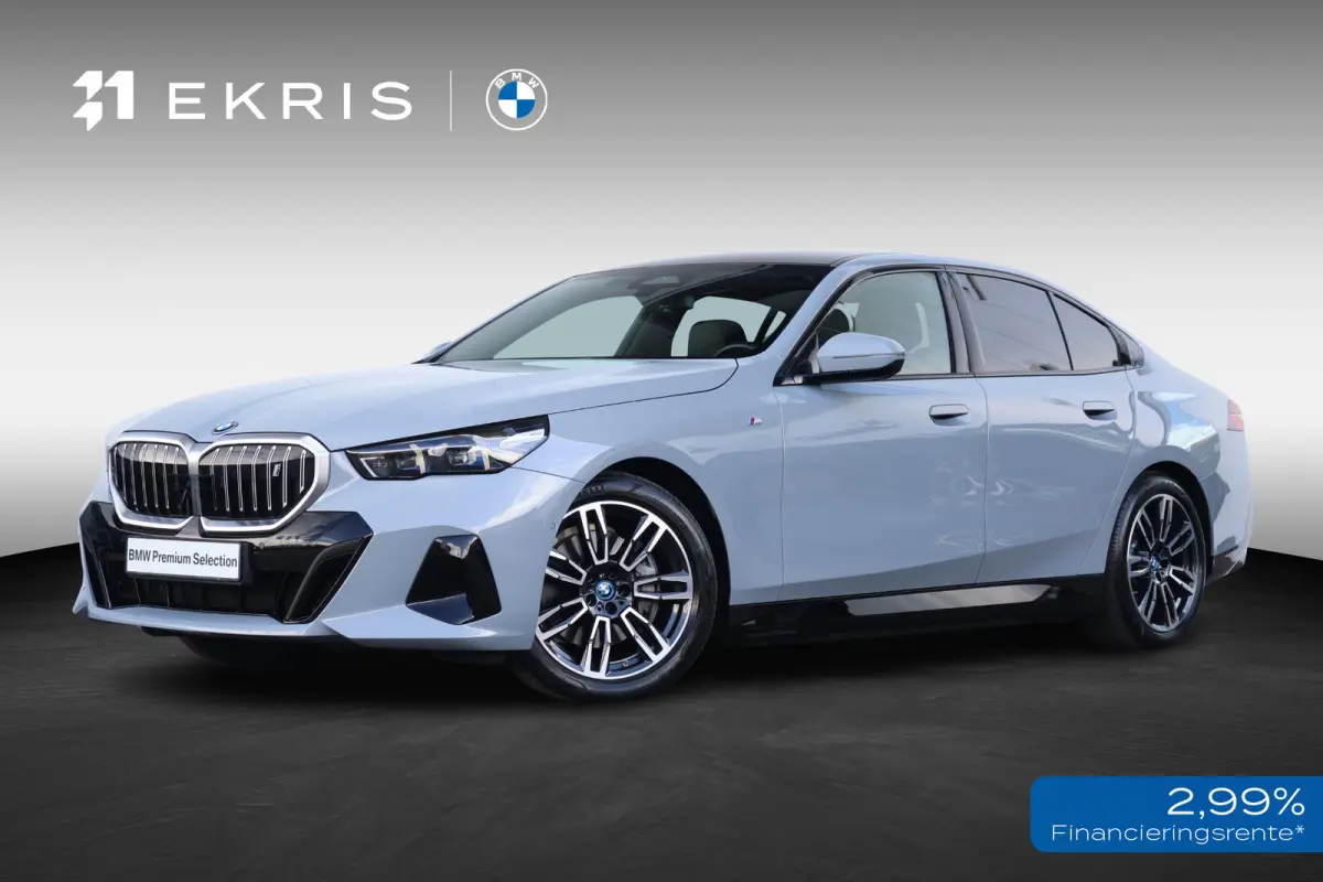 eDrive40 84 kWh | Soh 97% | M-Sport Pakket | Pano Dak | Trekhaak | Harman Kardon | Driving Assistant Plus | Verwarmde Voorstoelen |