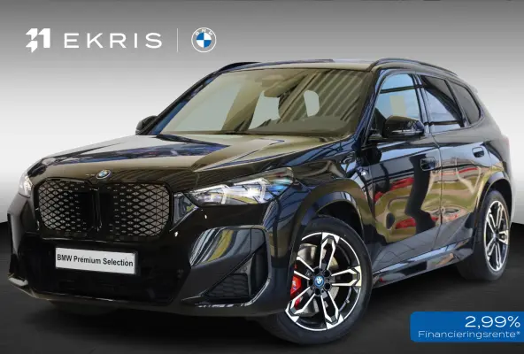 eDrive20 | M Sportpakket Pro | Driving Assistant Plus | SOH 100% | Head-Up Display | Stoelverwarming