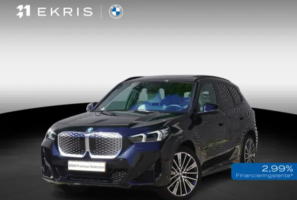 eDrive20 M Sportpakket | Premium Pack | Trekhaak met elektrisch wegklapbare kogel | Glazen panoramadak | Harman-Kardon sound system | Comfort Access |