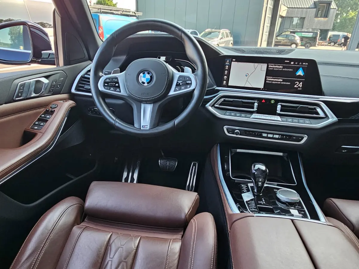 xDrive45e High Executive M-Sport | Luchtvering |  Elek. trekhaak | Safety pack | Achterasbesturing | HUD | M aerodynamica | Leder |