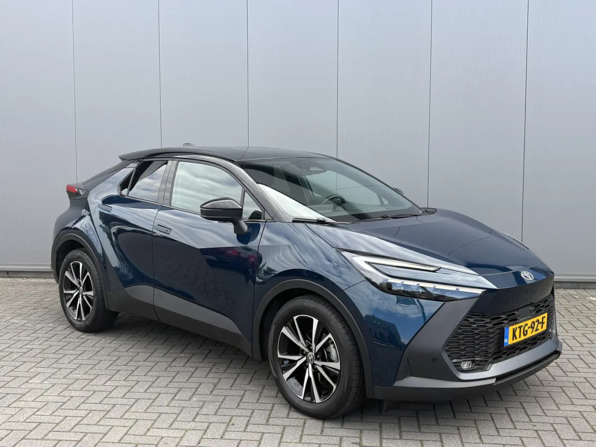 1.8 Hybrid 140PK First Edition Bi-Tone/Winter-pack/Gr.-navigatie/Elektr.klep/Camera/Adapt.-cruise