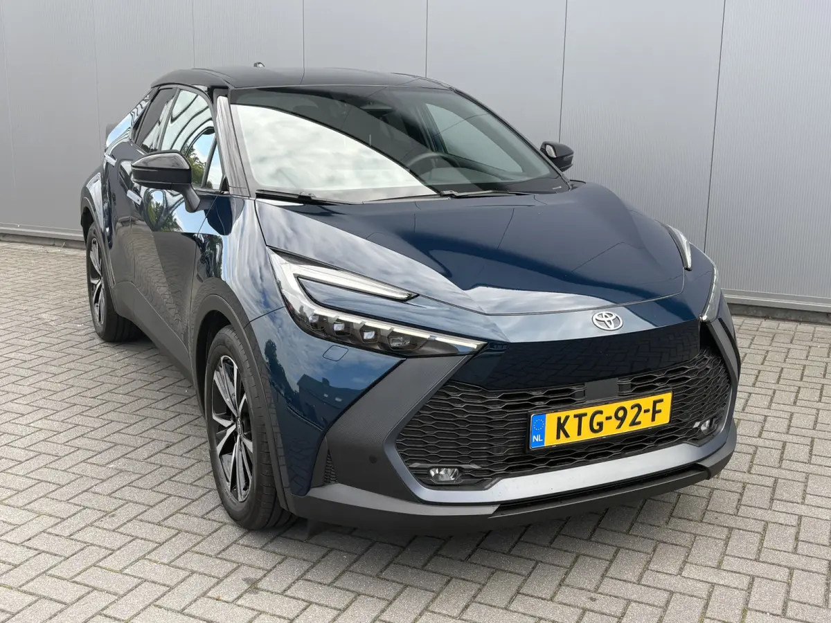 1.8 Hybrid 140PK First Edition Bi-Tone/Winter-pack/Gr.-navigatie/Elektr.klep/Camera/Adapt.-cruise