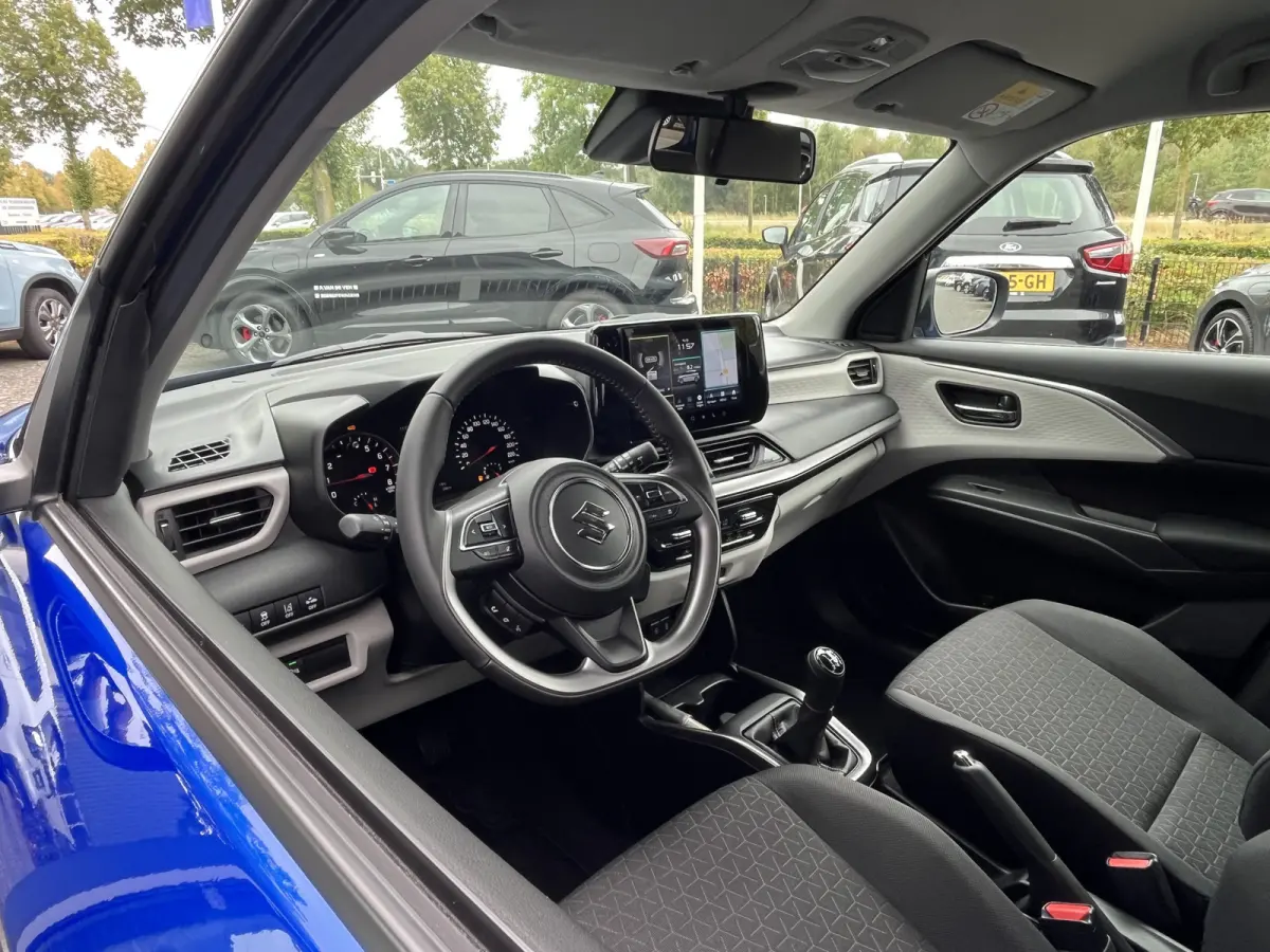 1.2 Smart Hybrid Style | Uit voorraad leverbaar | 1894 | €2.200,- voordeel | Adapt. Cruise | Camera | Stoelverwarming | 16'' | Dodehoek | Carplay/Android Auto | Smart Entry |