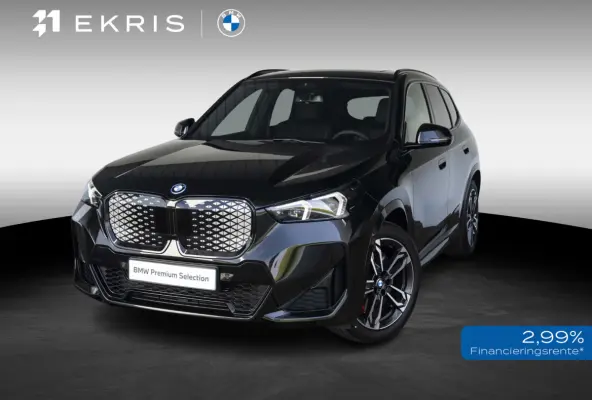 eDrive20 | M Sportpakket Pro | Premium Pack | Travel Pack | 19 inch | M Adaptief onderstel | Glazen panoramadak | Comfort Access | Driving Assistent Plus | Trekhaak