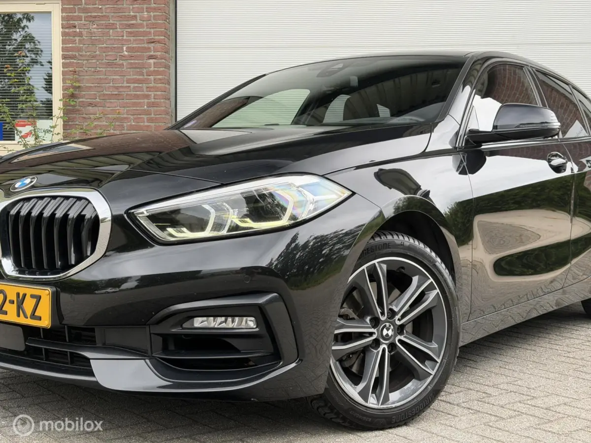 116i High Executive 2DE EIG Dealer OND CarPlay Sportstoelen