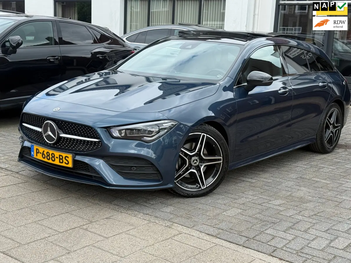180 Business Solution AMG,NL-auto,Panoramadak,Ambient,Stoelverwarming,Navigatie