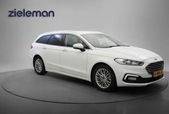 2.0 IVCT HEV Titanium - Carplay, Cruise, Clima, Stoelverw.