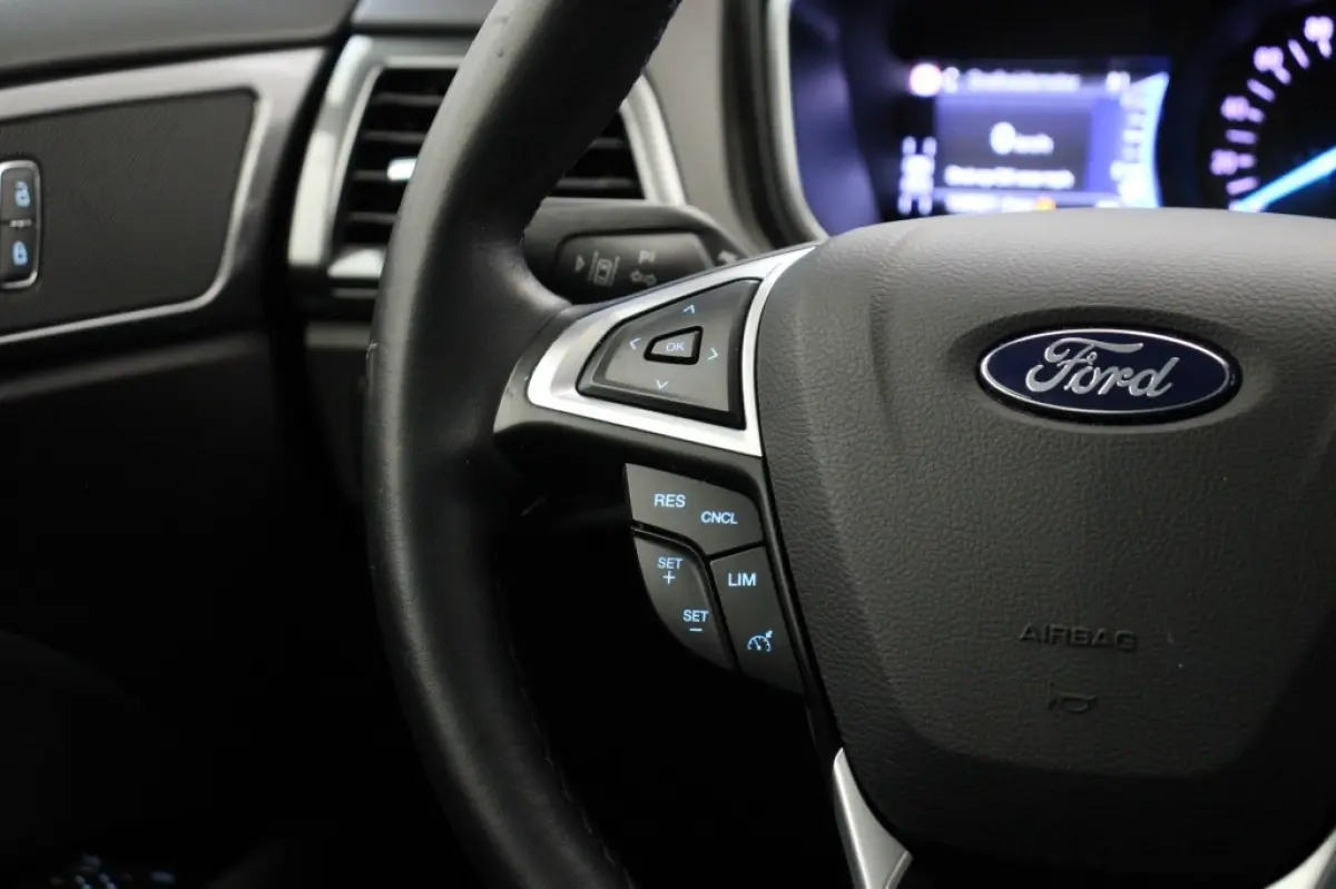 2.0 IVCT HEV Titanium - Carplay, Cruise, Clima, Stoelverw.