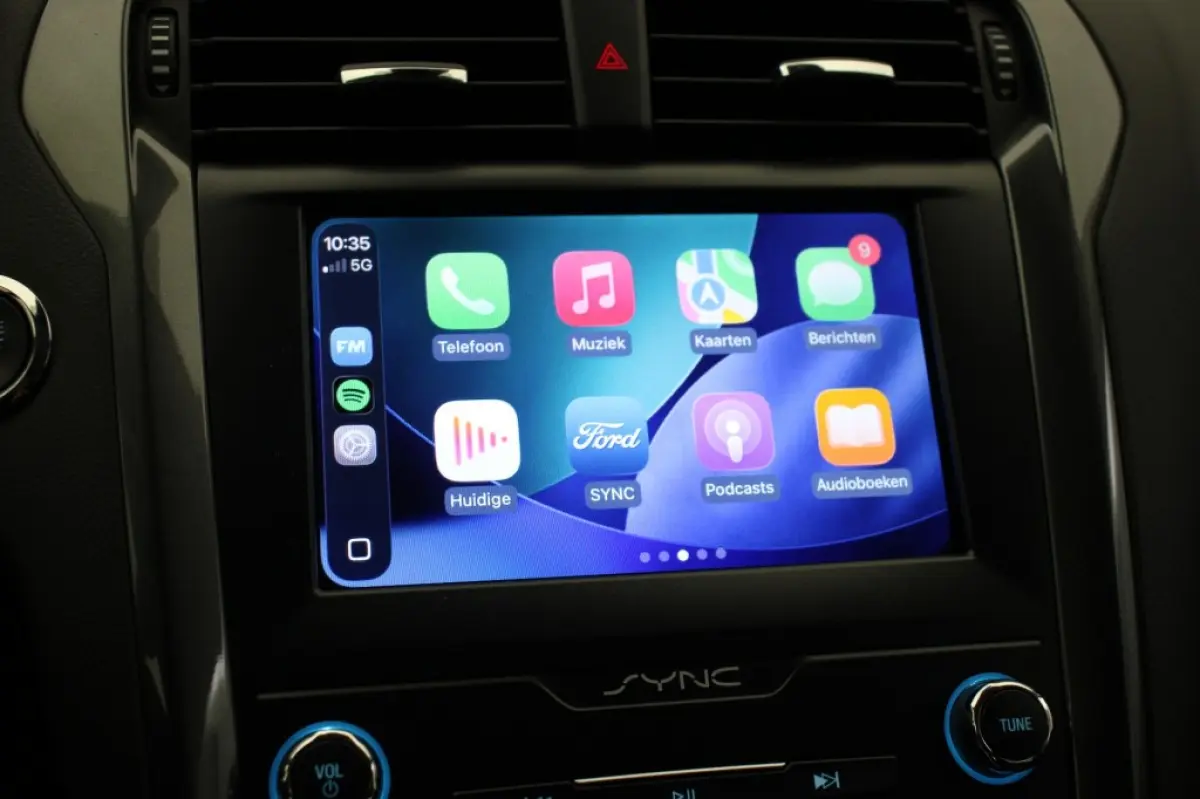 2.0 IVCT HEV Titanium - Carplay, Cruise, Clima, Stoelverw.