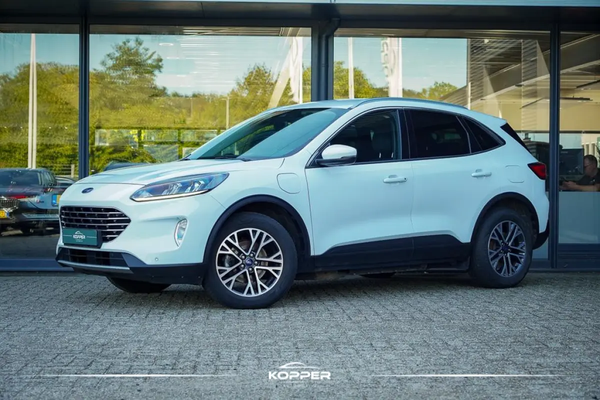 2.5 PHEV Titanium / Trekhaak wegklapbaar / Getint Glas / 18'' / Winterpack II / Incl BTW
