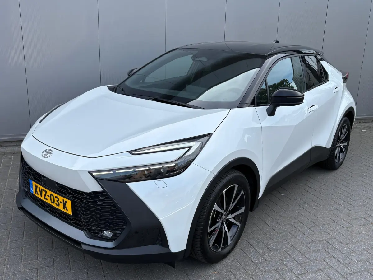 1.8 Hybrid 140PK First Edition Bi-Tone/Winter-pack/Gr.-navigatie/Elektr.klep/Camera/Adapt.-cruise