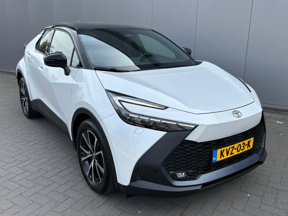 1.8 Hybrid 140PK First Edition Bi-Tone/Winter-pack/Gr.-navigatie/Elektr.klep/Camera/Adapt.-cruise