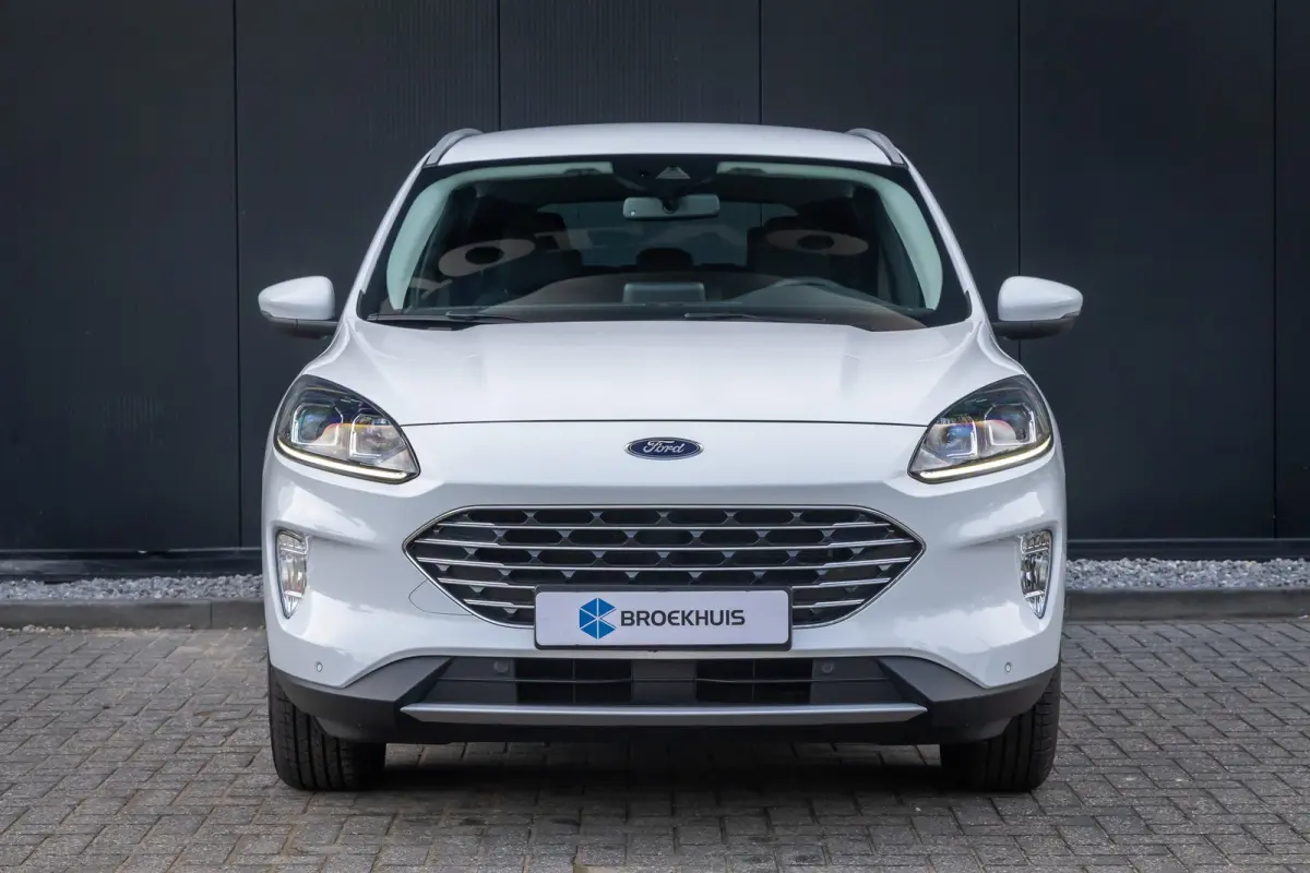 2.5 PHEV Titanium | Winter-pack | Camera | Apple carplay / andriod auto | Standkachel | Navigatie incl. bluetooth