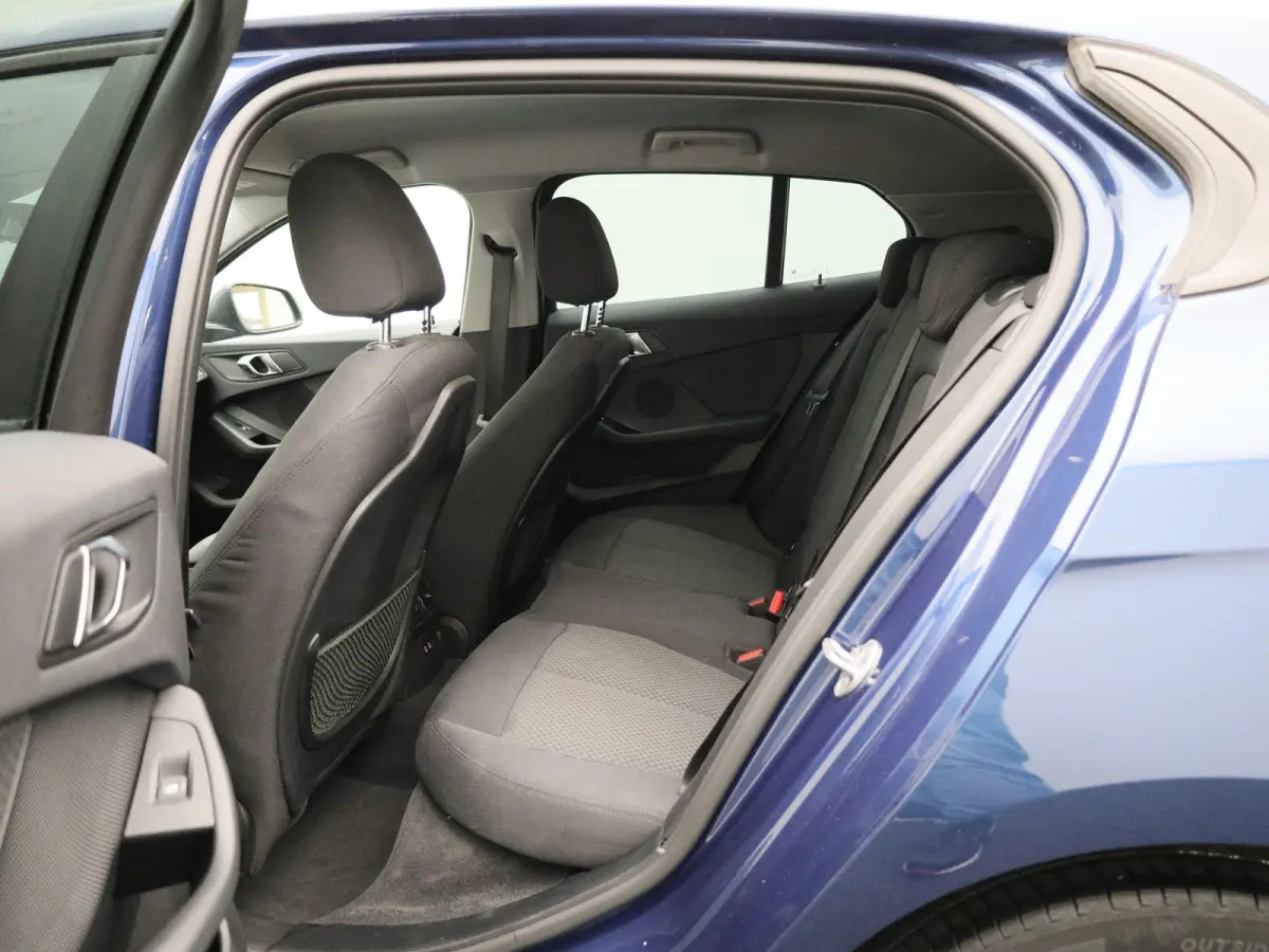 118i Business Edition | Automaat | Apple Carplay / Android Auto | Navigatie | Virtual Cockpit | Achteruitrijcamera | Climate Control | Cruise Control | Lichtmetalen Velgen |