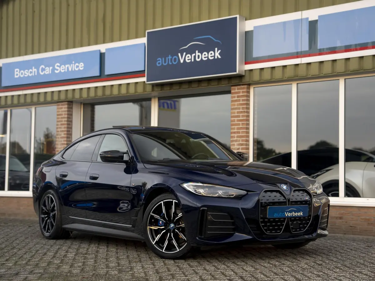 M50 High Executive 84 kWh | SOH 100%! | Pano | Memory stoel | Leder | M Stoelen | HuD | Comfort Access | Carbon Fibre int. | Tansanit Blau | 19" Y-spaak 859M wielen | Alarm kl.3