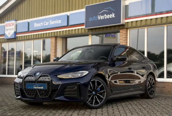 M50 High Executive 84 kWh | SOH 100%! | Pano | Memory stoel | Leder | M Stoelen | HuD | Comfort Access | Carbon Fibre int. | Tansanit Blau | 19" Y-spaak 859M wielen | Alarm kl.3