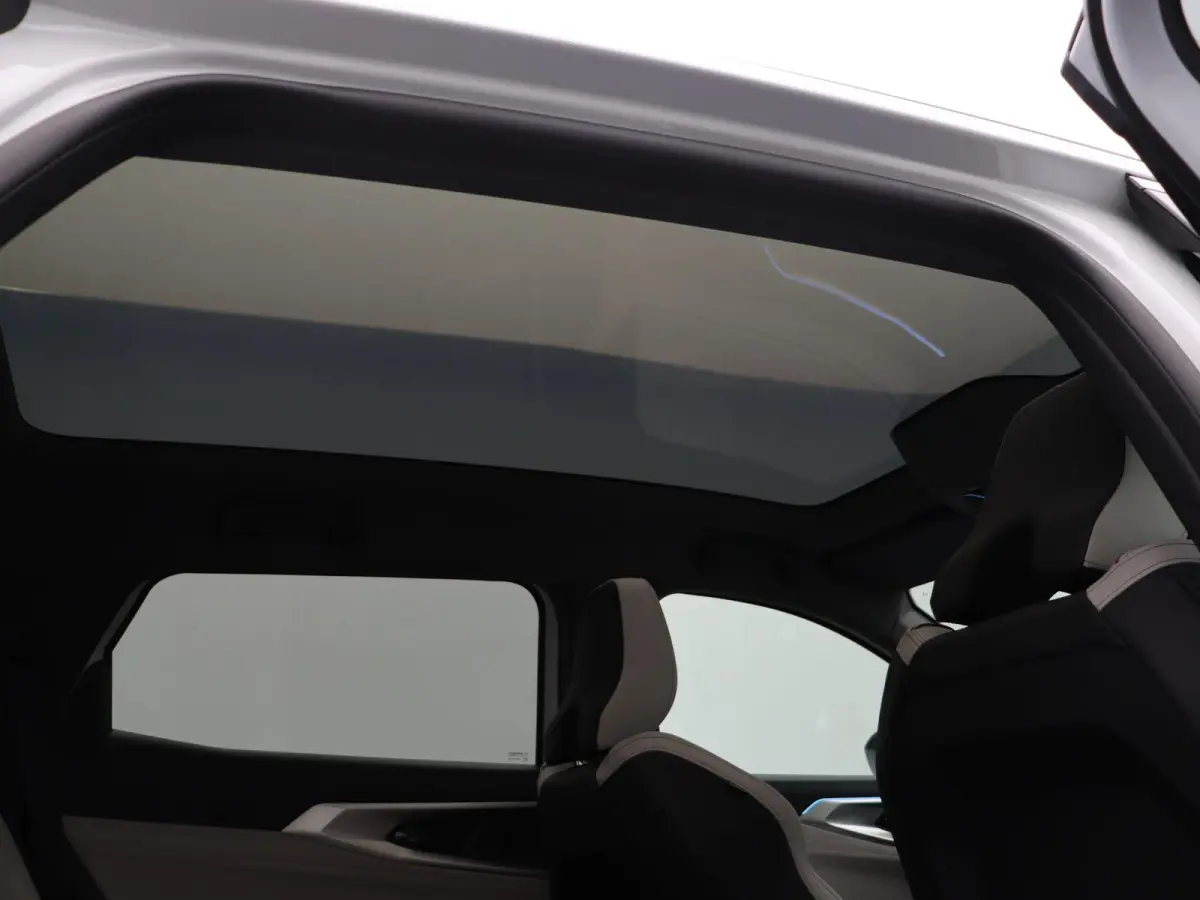 E-Tech full hybrid 200 iconic 7p. | Vijf jaar garantie | Harman Kardon | Panoramisch dak | HUD | Voorruitverwarming |