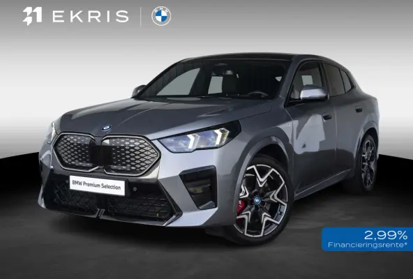 eDrive20 SoH 100% | M Sportpakket Pro | Innovation Pack | 20 inch | Stuurwielrand verwarmd | M Adaptief onderstel | Iconic Glow nierengrille | Glazen Panoramadak | Trekhaak