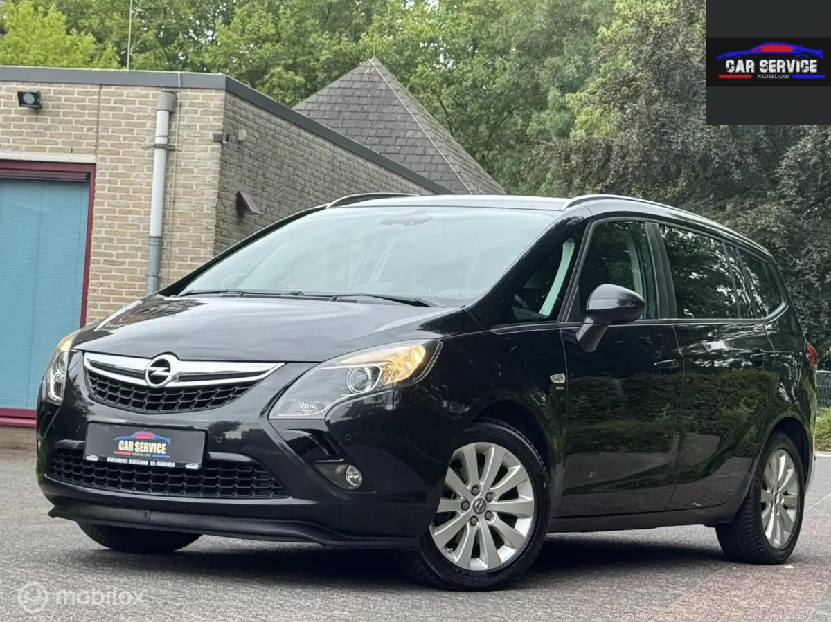 Tourer 1.4 Business+ 7p./CAMERA/NAVI/PDC/STLVW/