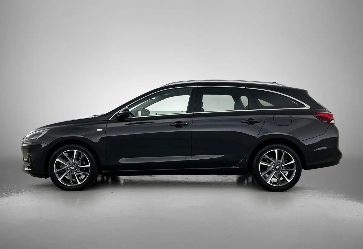 1.0 T-GDi MHEV Comfort Smart | Automaat | Navigatie | Achteruitrijcamera | DAB | Virtual Cockpit | Cruise Control | Climate Control | Lichtmetalen Velgen |
