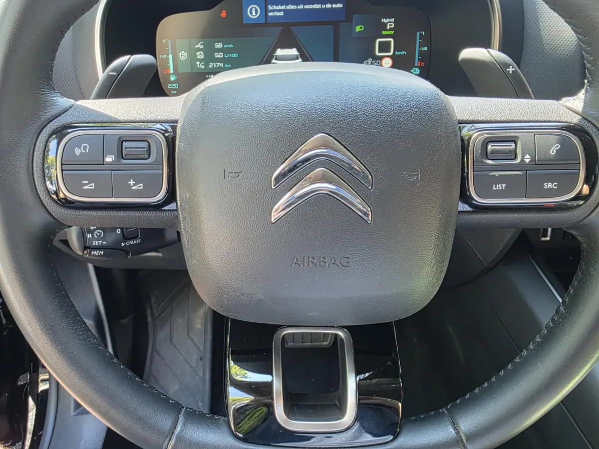 1.6 Plug-in Hybrid Feel | SOH 94.75% | Achteruitrijcamera | Climate control | Apple CarPlay / Android Auto | LM velgen |