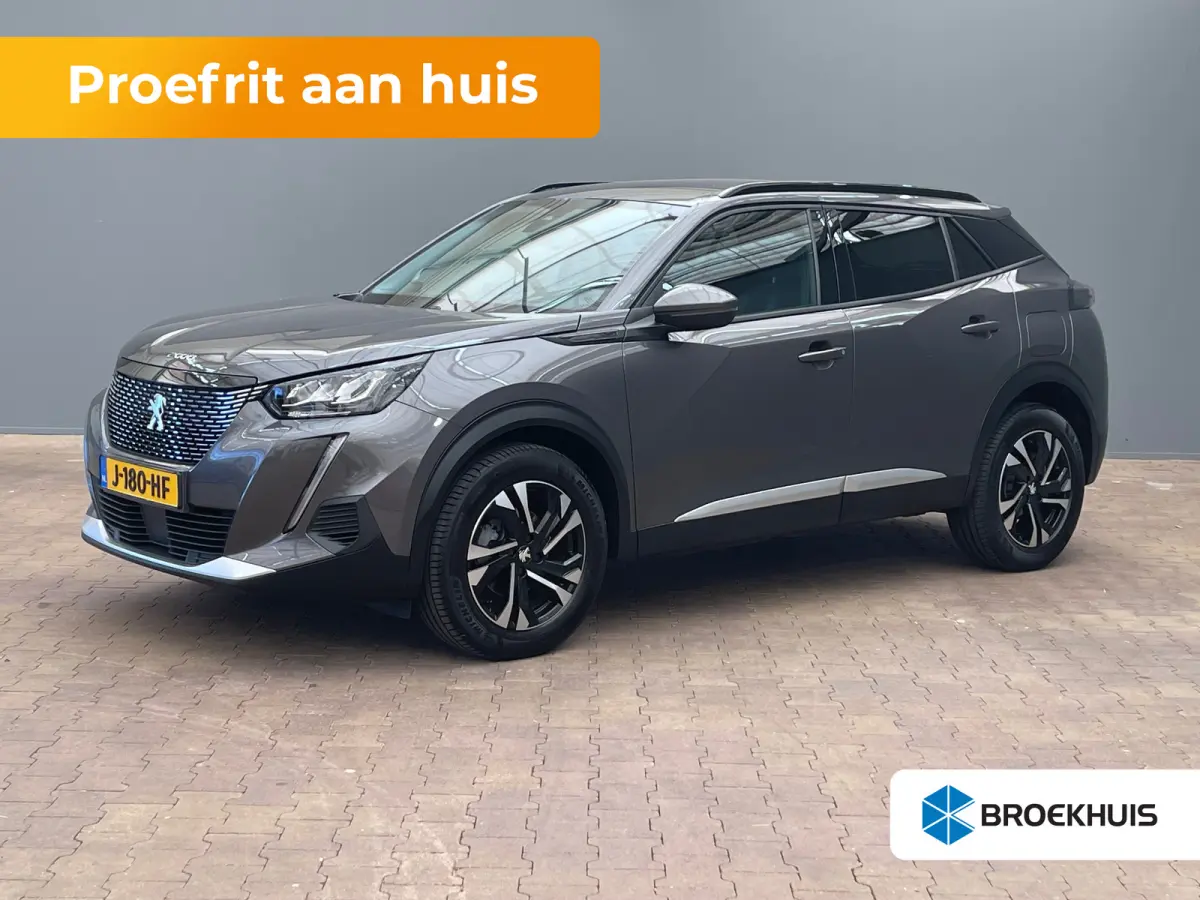 1.2 PureTech Allure | Achteruitrijcamera | Climate Control | Cruise Control | Extra getinte ramen | 17'' Lichtmetalen velgen |'| Achterbank in delen neerklapbaar | Achteruitrijcamera | Airco