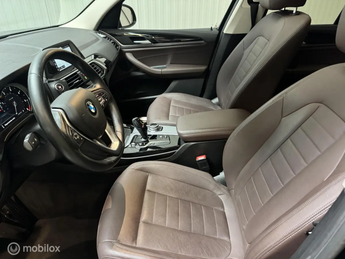 xDrive20d Schuifdak, Trekhaak, Lederen bekleding