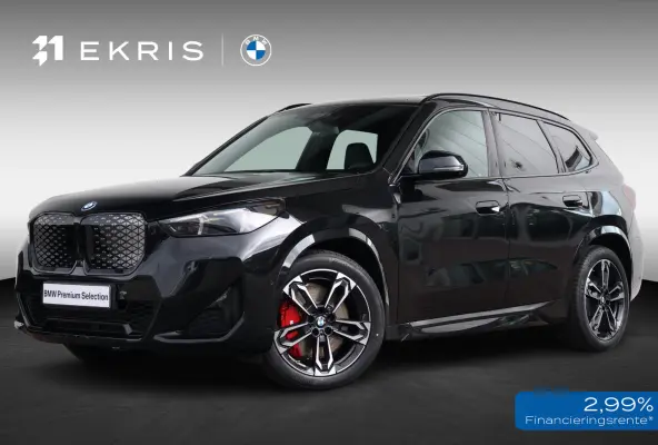 eDrive20 67 kWh M Sport Edition | Sport Pakket Pro | Panorama Dak | Stuur & Stoelverwarming | Driving Assistant Professional | Parking Assistant Plus | Head-Up | Harman Kardon | Elektr. Stoe