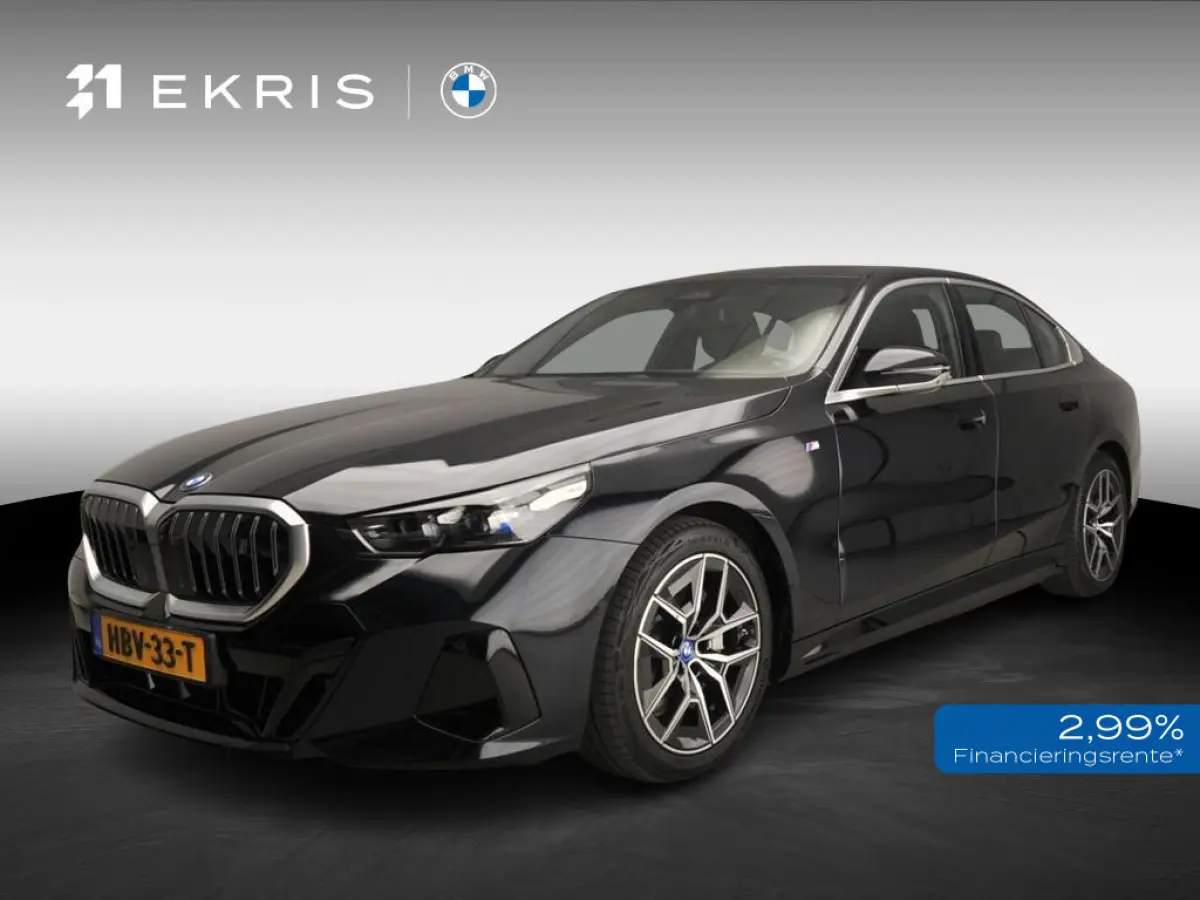 eDrive40 | M-Sportpakket | LED | Leder | HUD | Active cruise | Panoramadak | Comfortzetels | Trekhaak | DAB | Harman-kardon sound | Alu 19 inch
