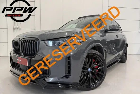 xDrive50e M-Sport DRAVITGRAU/PANO/22"/M-SPORTSTOELEN/MASSAGE+VENTILATIE/H&K/22"BLACK/SOH 93%/ICONIC-GLOW/360CAMERA/STANDKACHEL/DONKERE-HEMEL/M-SPORT PRO PAKKET/SHADOW-LINE/BODYKIT/VOLLEDIG B