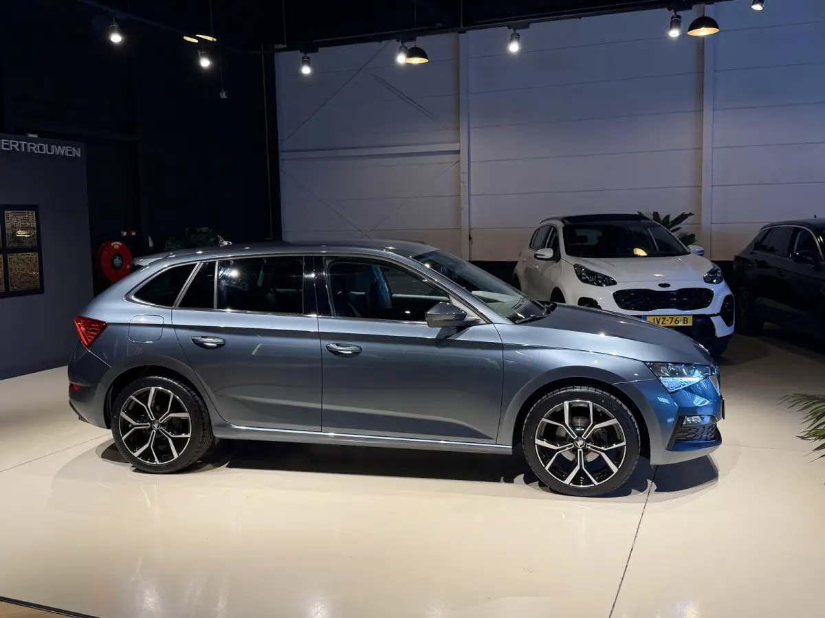 1.0 TSI DSG Ambition Navi|Carplay|LED|Stoelverw Grijs