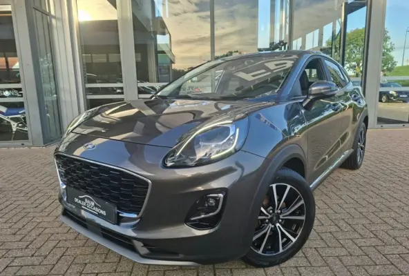 1.0 EB HYBRYDE TITANIUM AIRCO LMV PDC CARPLAY WINTERPACK