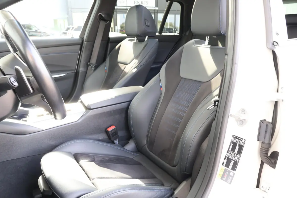 320e | M-Sport Pakket | Panorama Dak | PDC | Driving Assistant Professional | Achteruitrijcamera
