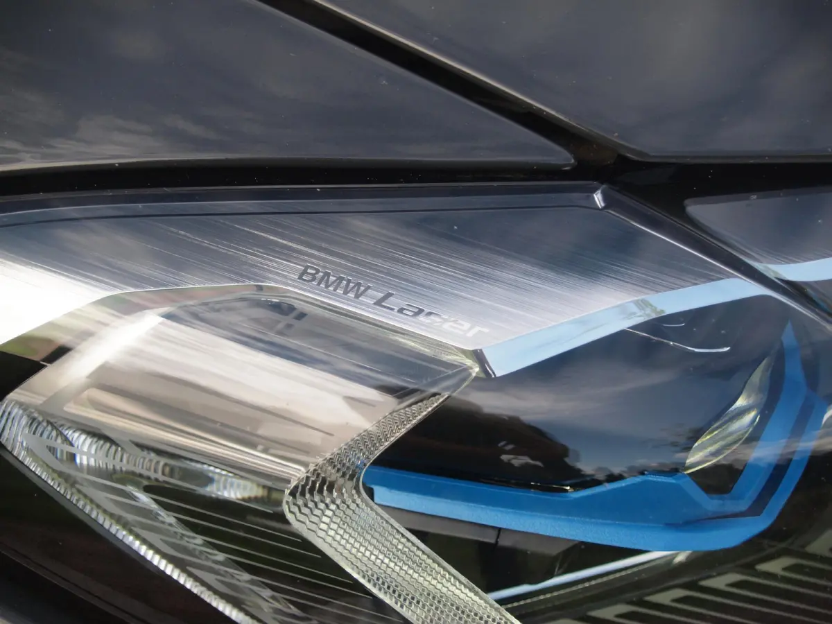 eDrive40 High Executive 84 kWh | SOH 98% | M-Pakket | Schuifdak | Sfeerverlichting | Led-Laser | Harman Kardon | Camera |