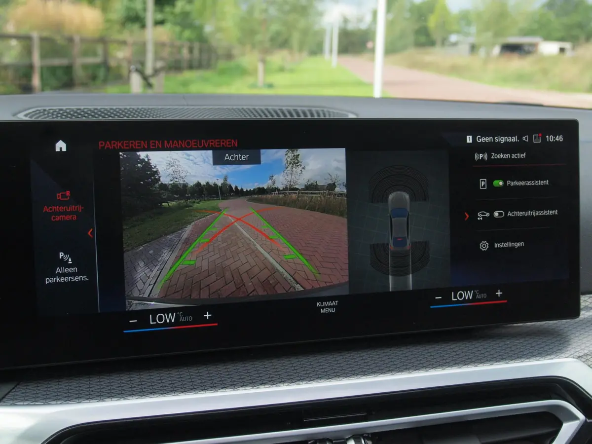 eDrive40 High Executive 84 kWh | SOH 98% | M-Pakket | Schuifdak | Sfeerverlichting | Led-Laser | Harman Kardon | Camera |