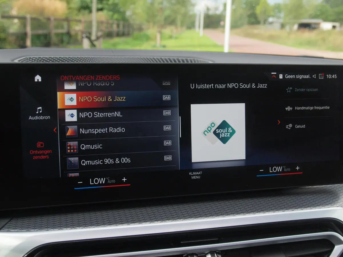 eDrive40 High Executive 84 kWh | SOH 98% | M-Pakket | Schuifdak | Sfeerverlichting | Led-Laser | Harman Kardon | Camera |