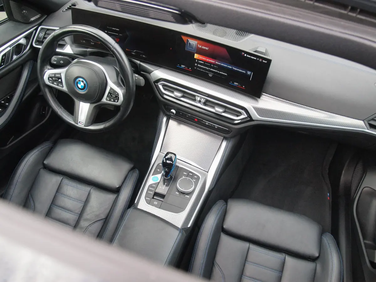 eDrive40 High Executive 84 kWh | SOH 98% | M-Pakket | Schuifdak | Sfeerverlichting | Led-Laser | Harman Kardon | Camera |