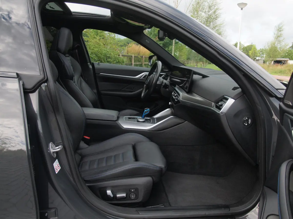 eDrive40 High Executive 84 kWh | SOH 98% | M-Pakket | Schuifdak | Sfeerverlichting | Led-Laser | Harman Kardon | Camera |