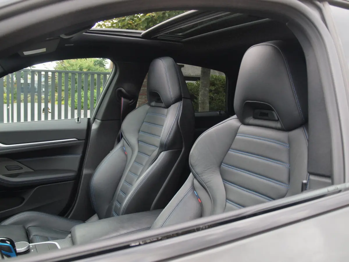 eDrive40 High Executive 84 kWh | SOH 98% | M-Pakket | Schuifdak | Sfeerverlichting | Led-Laser | Harman Kardon | Camera |