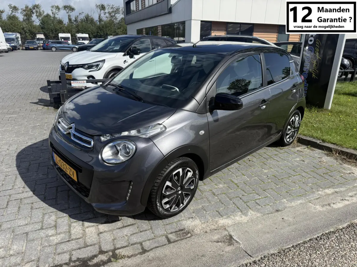 1.0 VTi Shine MILLENIUM AIRCO 5 DEURS PRIVACY GLASS