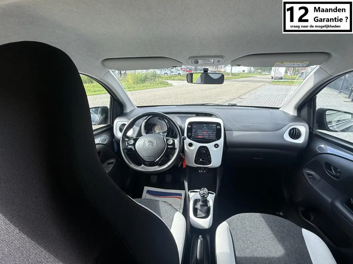 1.0 VTi Shine MILLENIUM AIRCO 5 DEURS PRIVACY GLASS