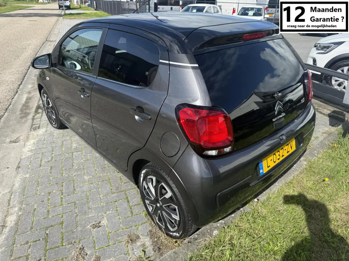 1.0 VTi Shine MILLENIUM AIRCO 5 DEURS PRIVACY GLASS
