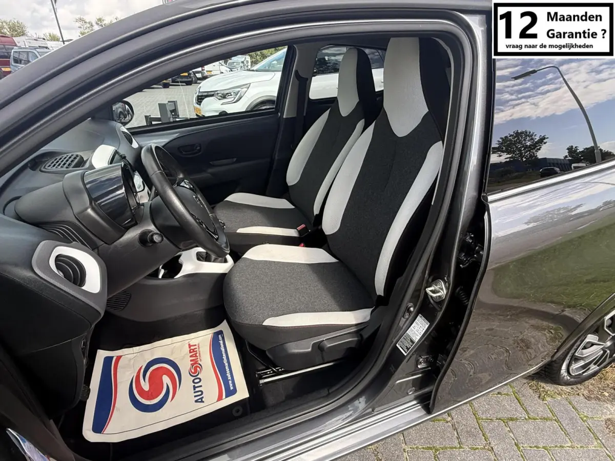 1.0 VTi Shine MILLENIUM AIRCO 5 DEURS PRIVACY GLASS