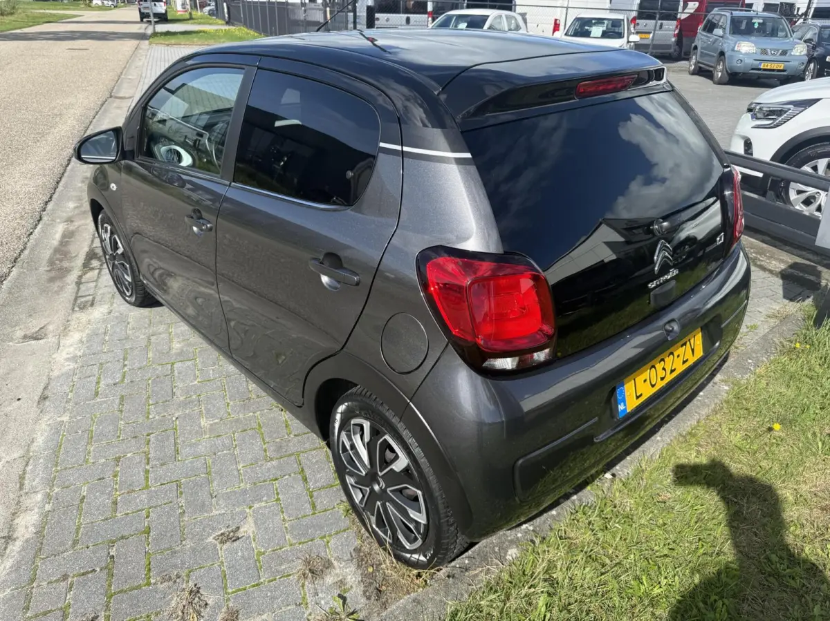 1.0 VTi Shine MILLENIUM AIRCO 5 DEURS PRIVACY GLASS