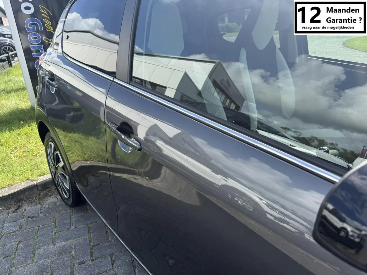 1.0 VTi Shine MILLENIUM AIRCO 5 DEURS PRIVACY GLASS