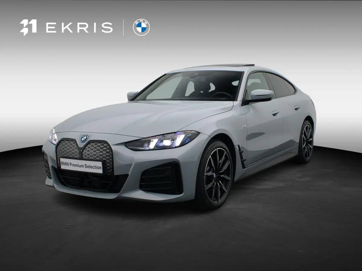 eDrive40 M Sportpakket Pro | Innovation Pack | Comfort Pack | Schuifdak | Driving Assistant | Harman Kardon | 19''