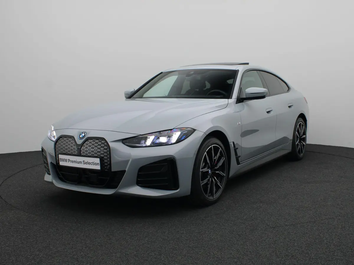 eDrive40 M Sportpakket Pro | Innovation Pack | Comfort Pack | Schuifdak | Driving Assistant | Harman Kardon | 19''